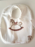 Petit Laure Pink Rocking Horse Bib